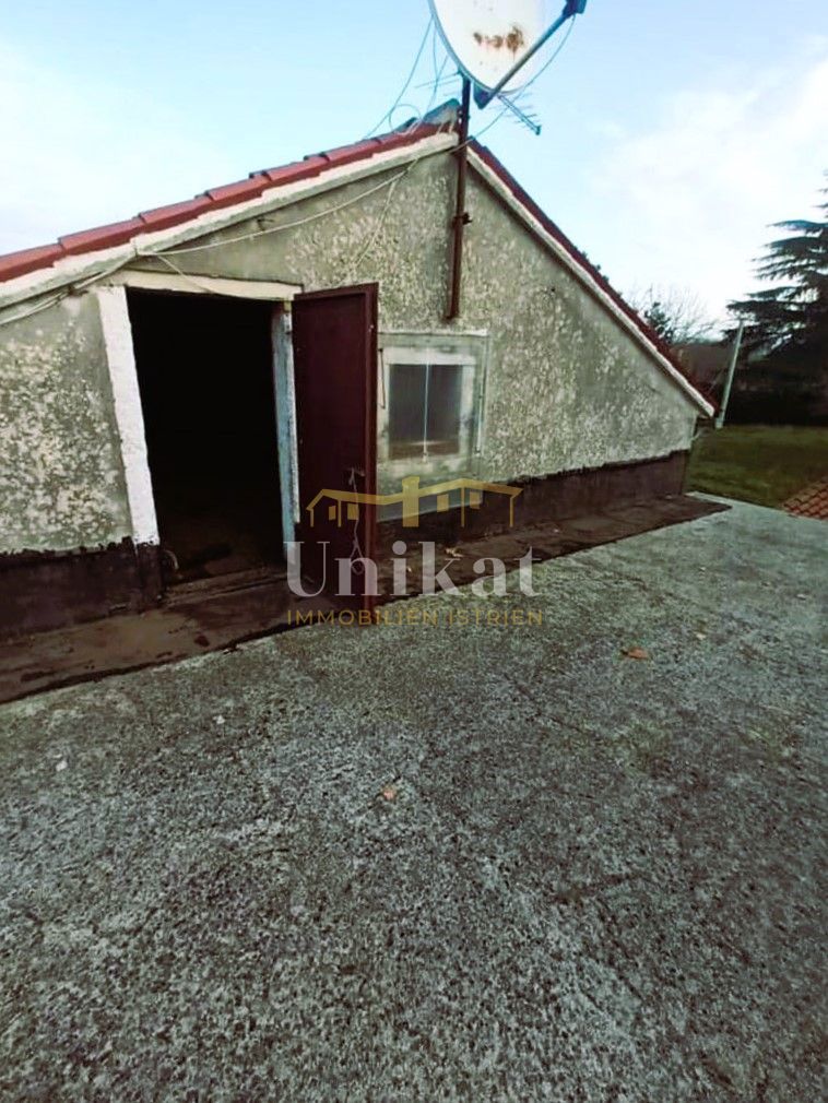 Casa bifamiliare in pietra abitabile, da ristrutturare